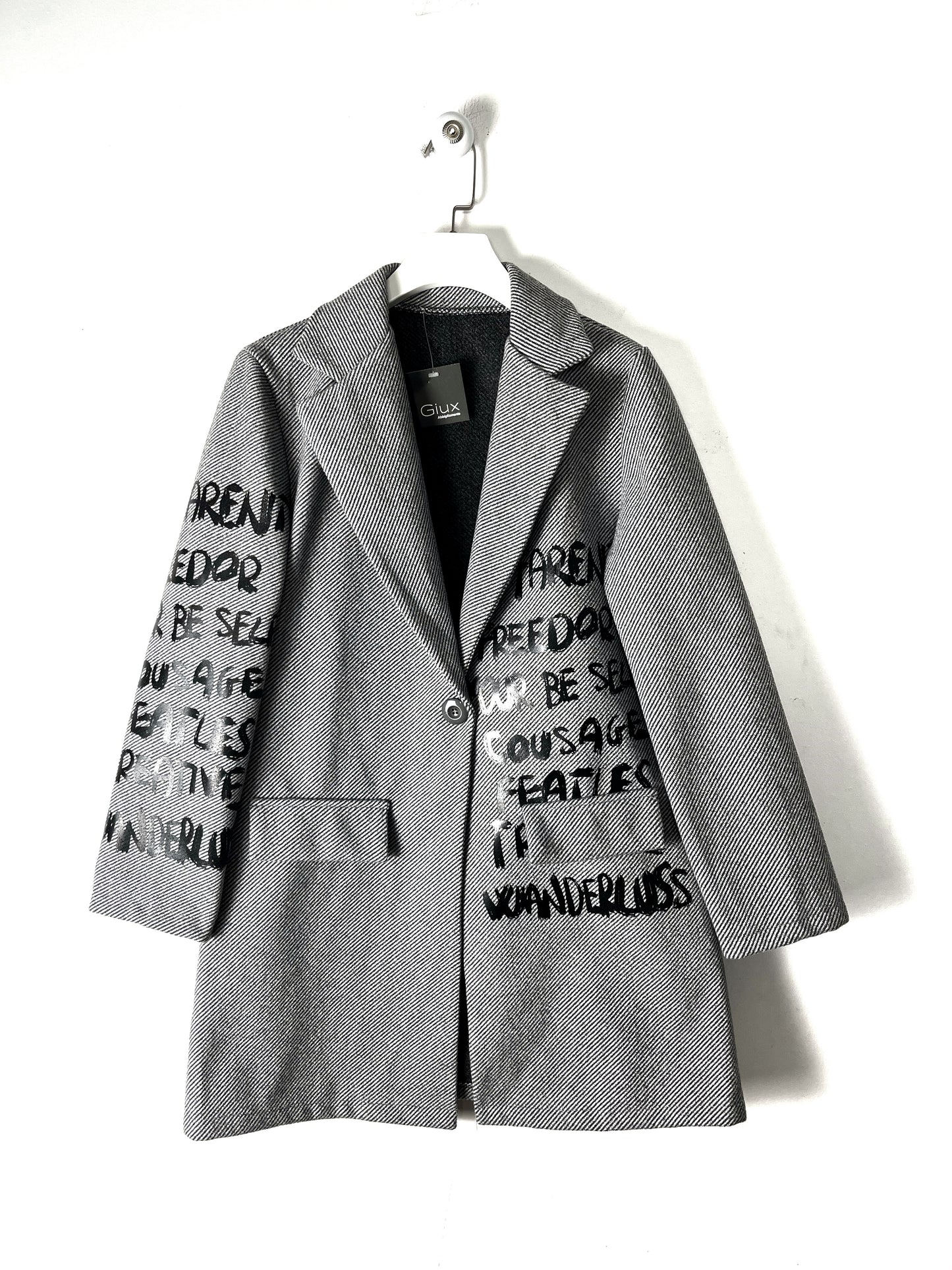 Cappotto scritte