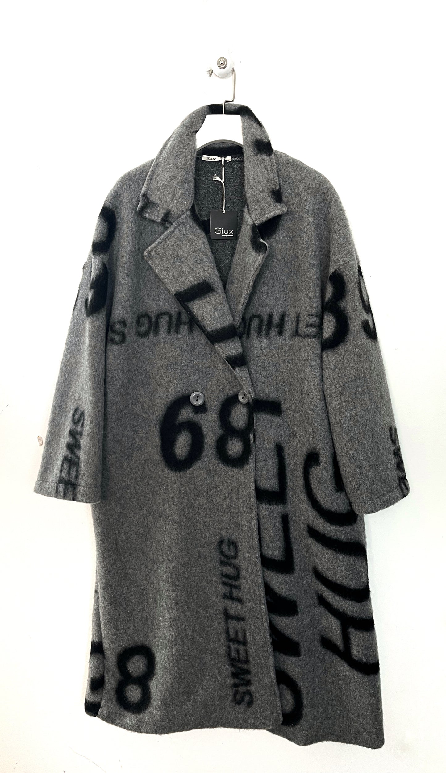 Cappotto scritte in lana cotta